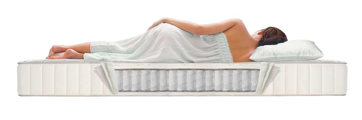 Alvó nő táskarugós matracon